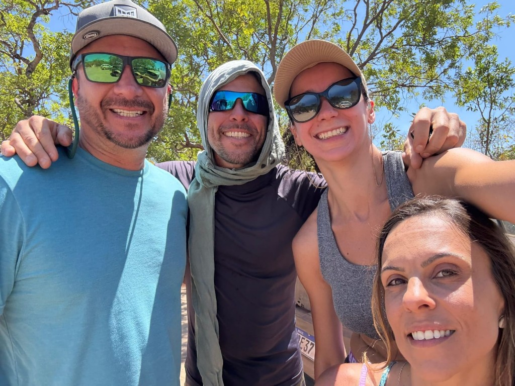 Group selfie with a local guide at Couros Falls, Chapada dos Veadeiros, Alto Paraíso de Goiás