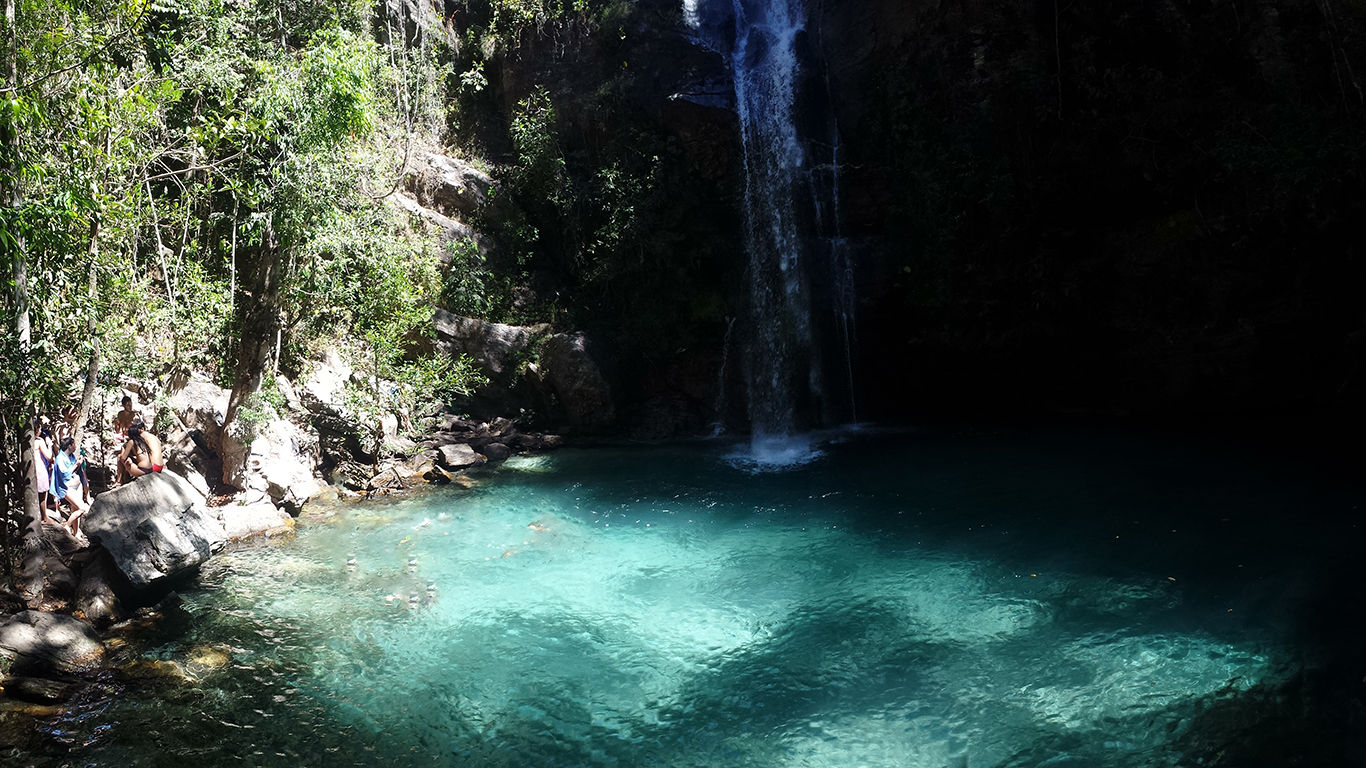 Turquoise pool at Santa Bárbara waterfall, Cavalcante, Chapada dos Veadeiros, falls in the background